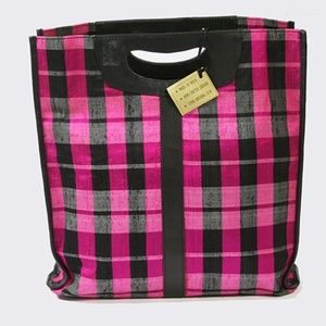 Raw silk with leather trim hand made tote.